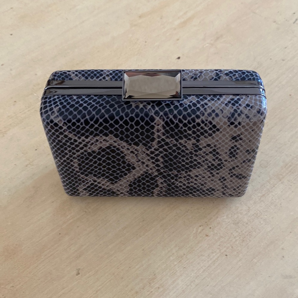 Manoukian snakeskin box clutch